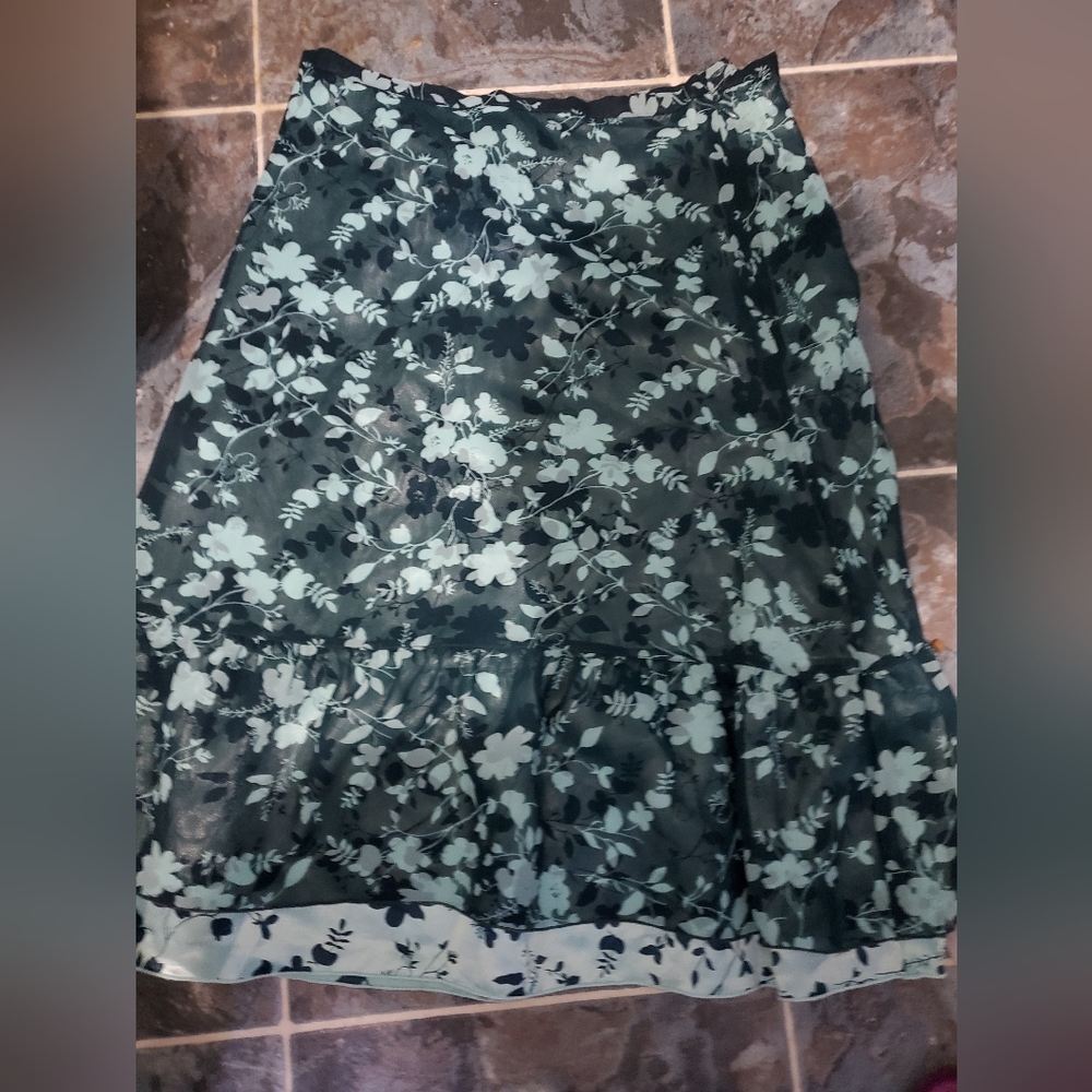 Green floral patterned knee length skirt